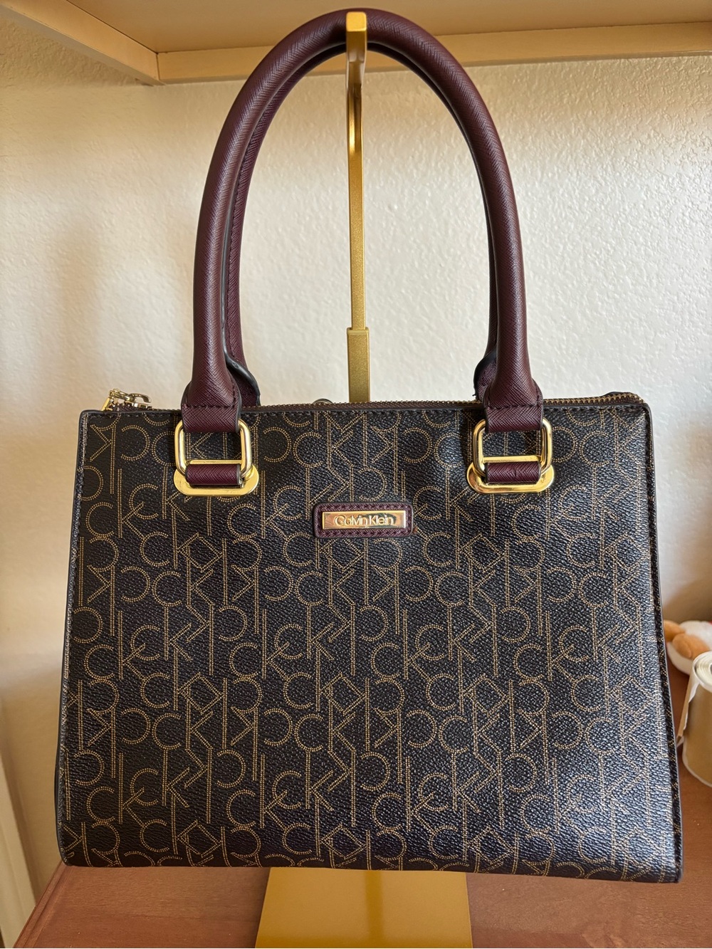 Calvin Klein Brown Monogram Satchel with Burgundy Handles and Gold Hardware